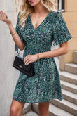 Perfee Printed Smocked Crisscross V-Neck Mini Dress