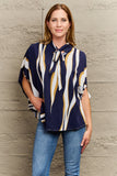 Perfee Tie Neck Printed Slit Sleeve Blouse