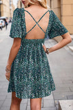 Perfee Printed Smocked Crisscross V-Neck Mini Dress