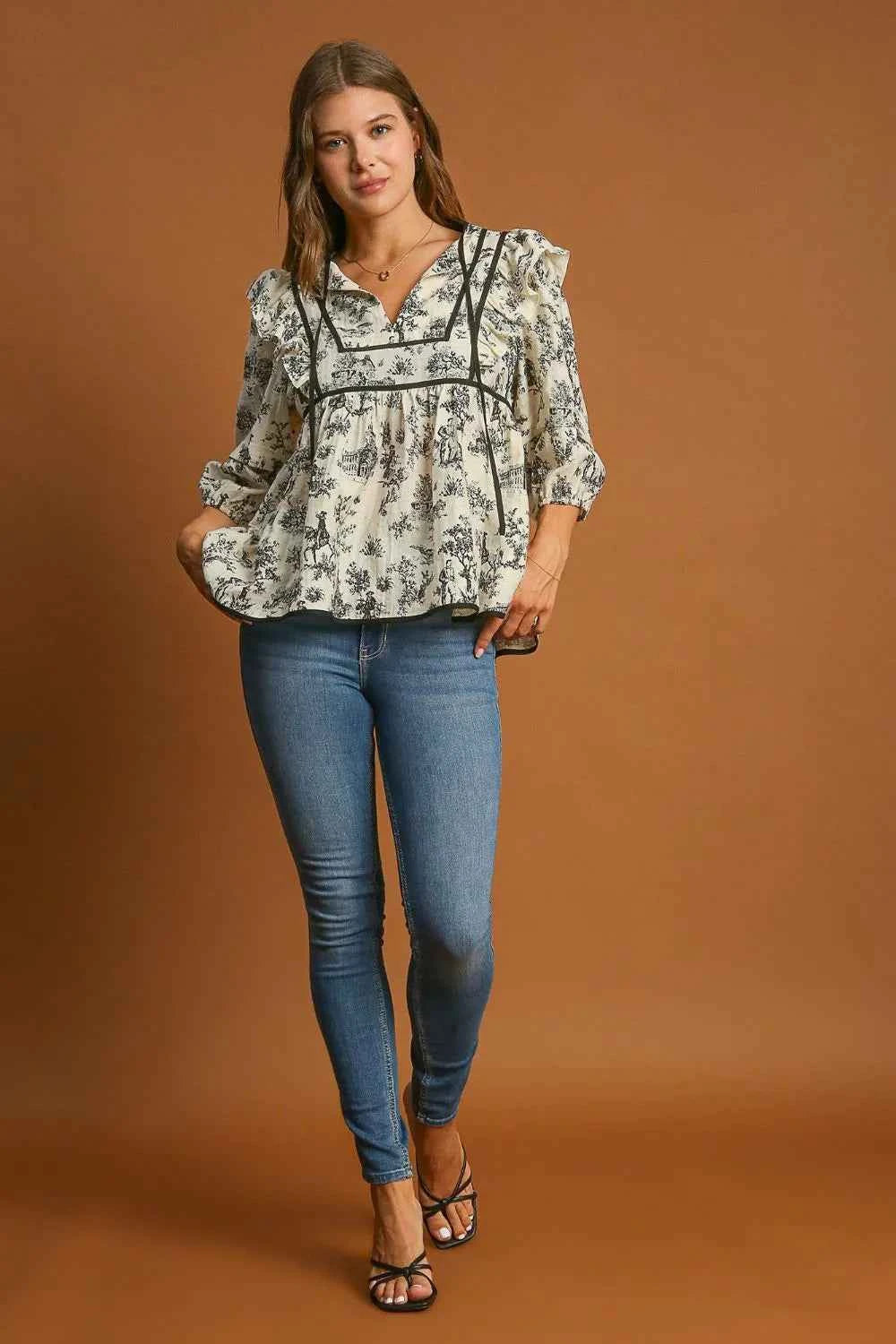 Umgee Ruffled Tie Neck Puff Sleeve Babydoll Blouse