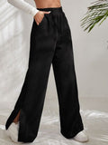 Slit Pocketed High Waist Wide Leg Pants elegancydose