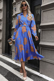 Perfee Floral Pleated Surplice Long Sleeve Midi Dress