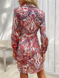 Perfee Tied Printed Long Sleeve Mini Dress