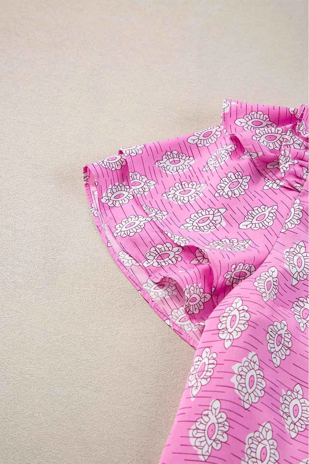 Ruffled Printed Tie Neck Short Sleeve Blouse